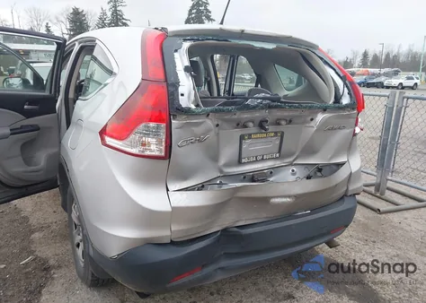 2013 Honda Cr-V Lx z USA, uszkodzony, nr VIN 2HKRM4H31DH641412